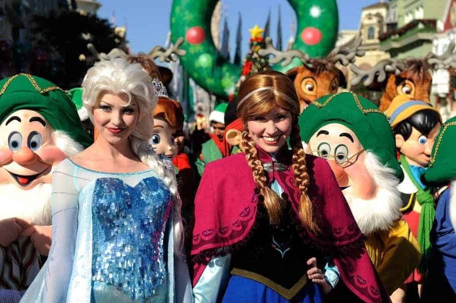 Disney characters Elsa (left) and Anna (right) at the Magic Kingdom park at Walt Disney World Resort