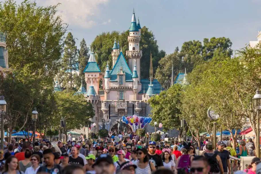 A huge crowd in front of the Sleeping Beauty Castle in Disneyland Park, California